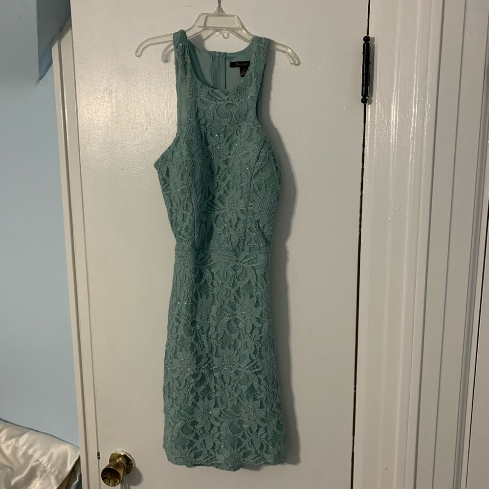 Mini dress with lace and sparkle detailing and cut out on back